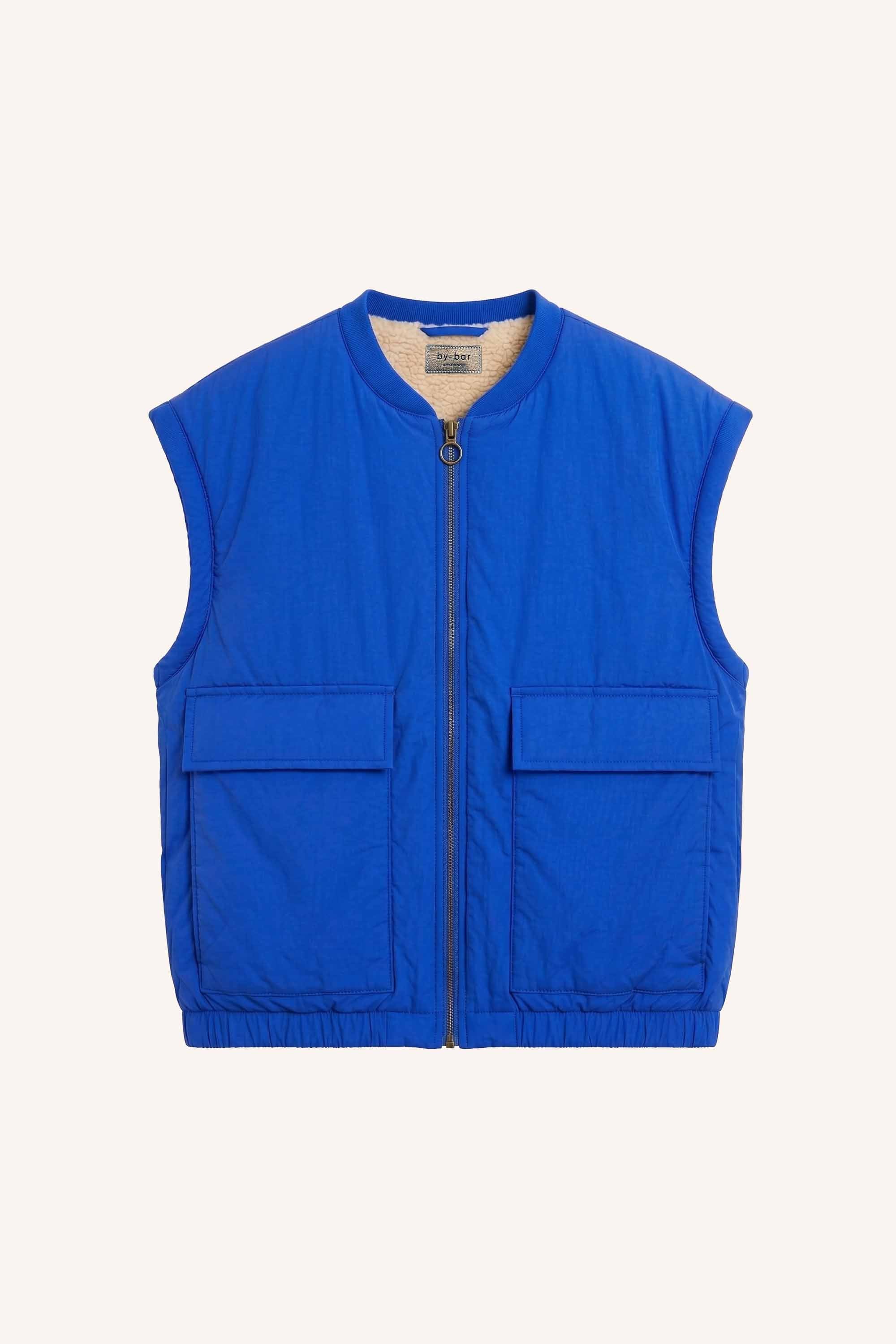 gio-sleeveless-jacket-kingsblue-fleece_pocket_lining-binnenvoering-draagbaar aan beide zijden-by-bar-productfoto